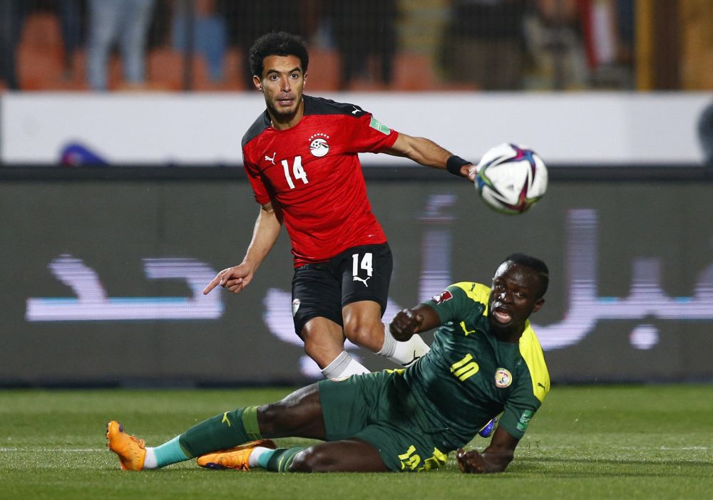 Egypt's Omar Gaber in action with Senegal's Sadio Mane at the Cairo International Stadium, Cairo March 25, 2022. u00e2u20acu201d Reuters pic