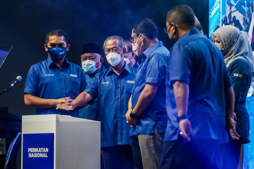 Tan Sri Muhyiddin Yassin (centre) attends the launch of Perikatan Nasionalu00e2u20acu2122s manifesto ahead of the Johor state election in Johor Bahru March 2, 2022. u00e2u20acu201d Picture by Hari Anggara