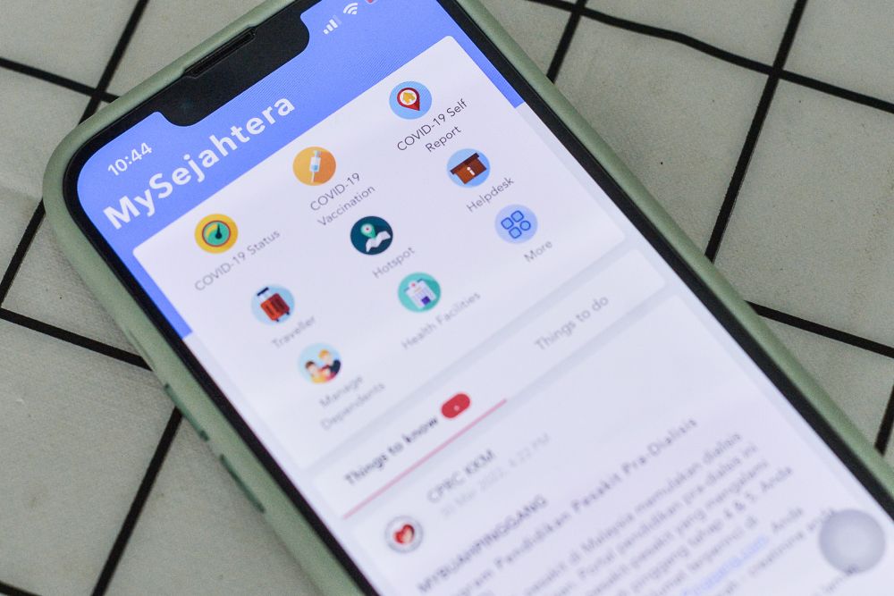 The MySejahtera app is pictured on a phone in Shah Alam March 31, 2022. u00e2u20acu201d Picture by Miera Zulyana