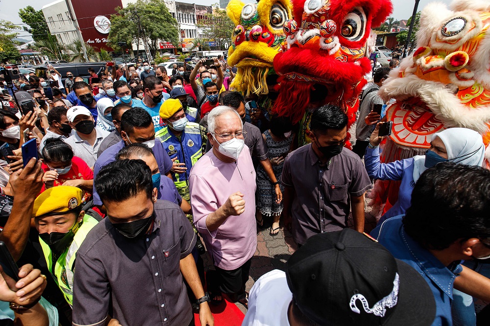 Datuk Seri Najib Razak is greeted by the public during his visit to Bukit Mertajam March 25, 2022. u00e2u20acu2022 Picture by Sayuti Zainudin