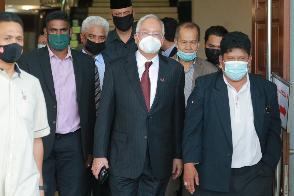 Datuk Seri Najib Razak leaves the Kuala Lumpur Court Complex, March 24 2022. u00e2u20acu201d Picture by Devan Manuel