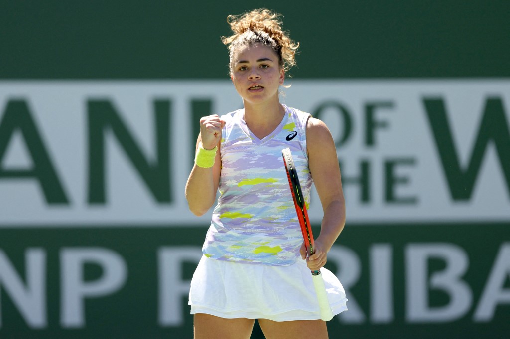 Jasmine Paolini of Italy celebrates while playing Aryna Sabalenka of Belarus during the BNP Paribas Open at the Indian Wells Tennis Garden, March 12, 2022 in Indian Wells, California. u00e2u20acu201d Getty Images via AFP
