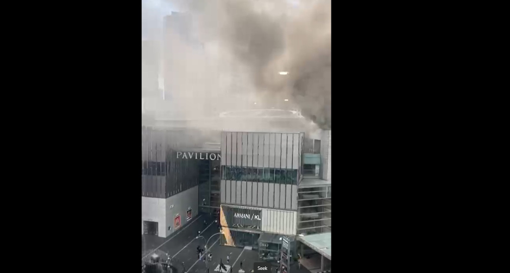 A screengrab of the video showing smoke billowing from the roof of Pavilion Kuala Lumpur, March 30, 2022.  