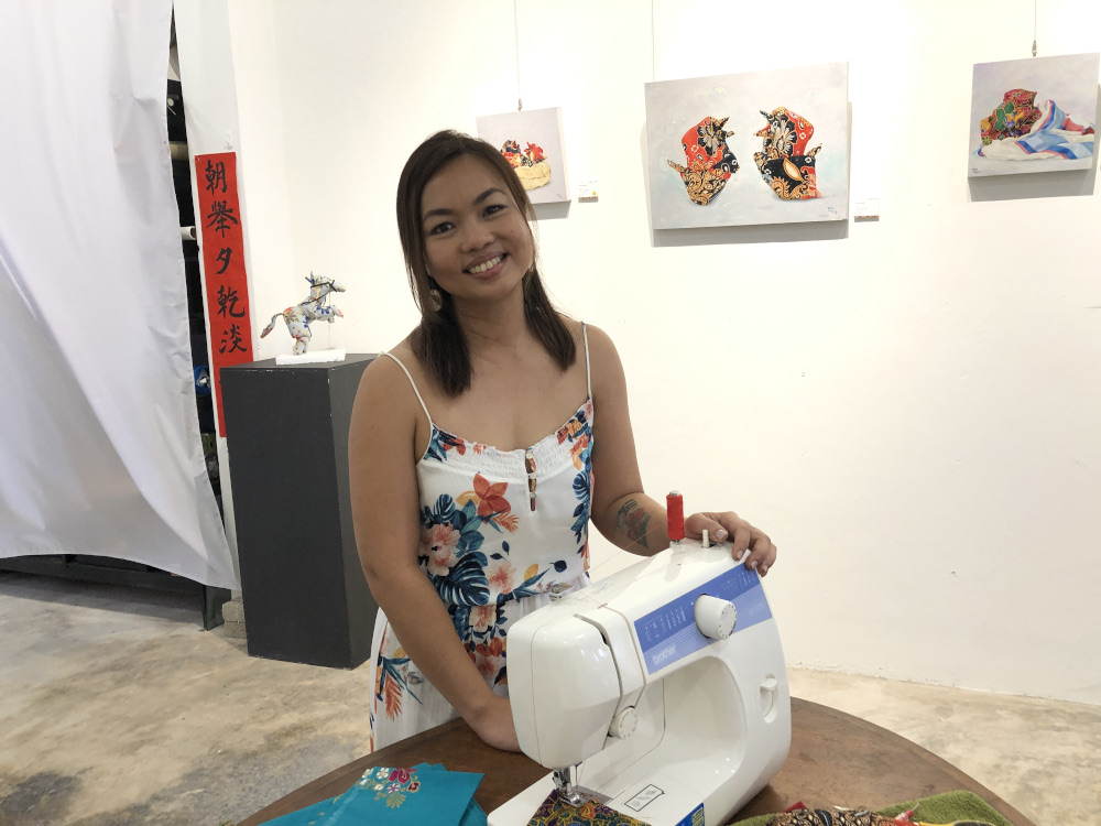 Penang artist Mandy Maung at the Orikata Tales exhibition. — Picture by Opalyn Mok