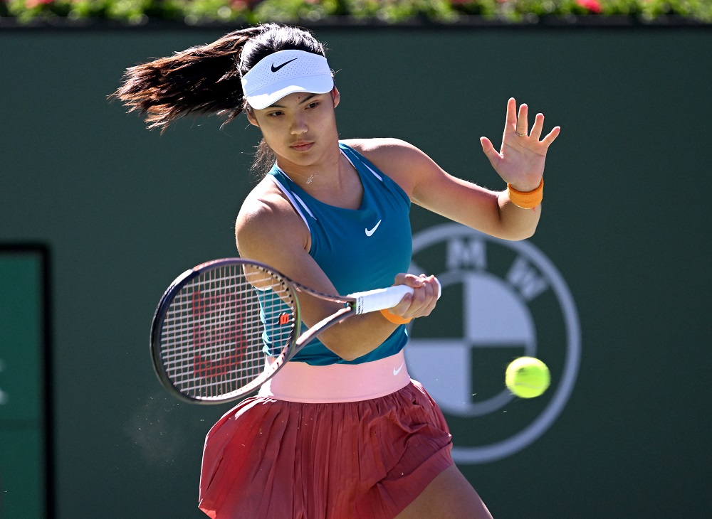 Britainu00e2u20acu2122s Emma Raducanu hits a shot in a second round match of the BNP Paribas Open at the Indian Wells Tennis Garden March 11, 2022. u00e2u20acu2022 Jayne Kamin-Oncea-USA TODAY Sports via Reuters