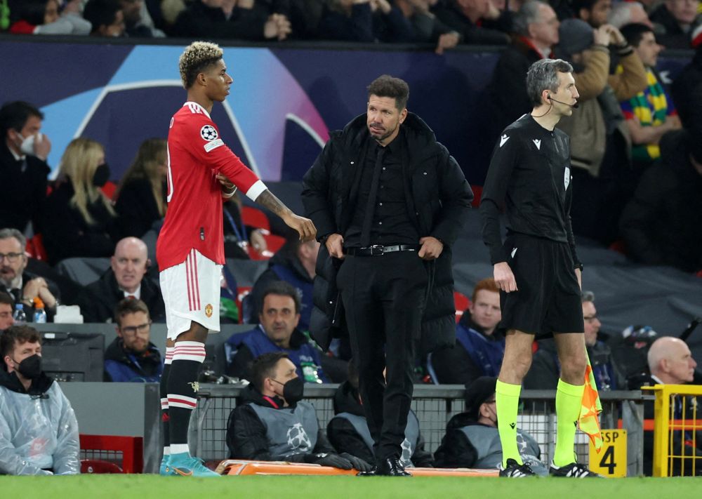 Manchester United's Marcus Rashford gets ready to come on as a substitute as Atletico Madrid coach Diego Simeone looks on at Old Trafford, Manchester March 15, 2022. u00e2u20acu201d Reuters pic