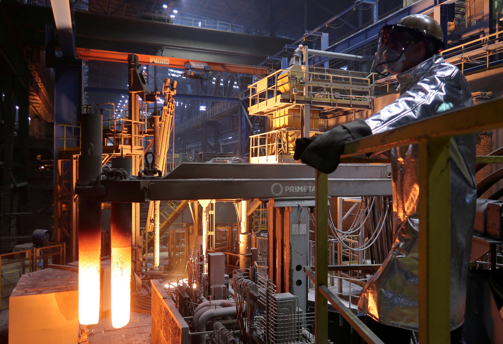 An employee stands near a ladle furnace for adding other components to raw steel at the plant of steelmaker Severstal in Cherepovets October 22, 2018. u00e2u20acu201d Reuters pic