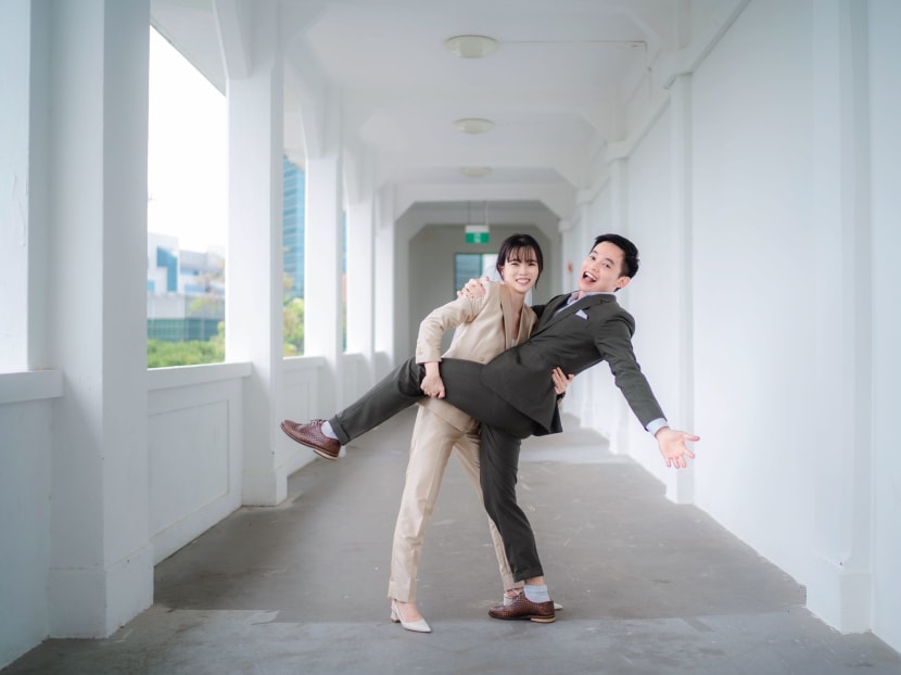 Tan Qi Ting and Joel Teng posing at a pre-wedding photo shoot. Tan found out she was Covid-positive just one day before her wedding reception. u00e2u20acu2022 Picture courtesy of Tan Qi Ting via TODAY
