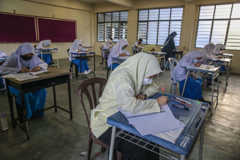 Form Five students sit for their SPM examination at SMK Seksyen 7 in Shah Alam March 2, 2022. — Picture by Yusof Mat Isa