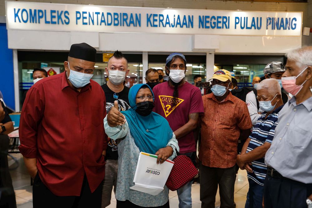 NGO Urban Life Volunteers secretary Sarah Abdullah speaks to members of the press at Komtar, George Town March 16, 2022. u00e2u20acu201d Picture by Sayuti Zainudinnn