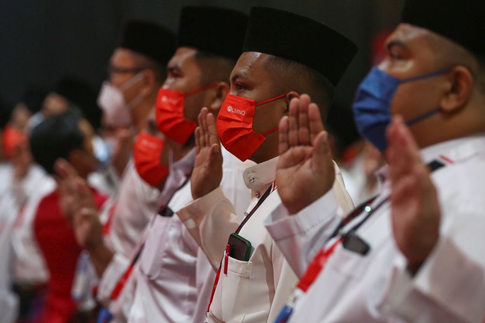Delegates attend the 2021 Umno General Assembly at the World Trade Centre Kuala Lumpur March 17, 2022. u00e2u20acu201d Picture by Yusof Mat Isa