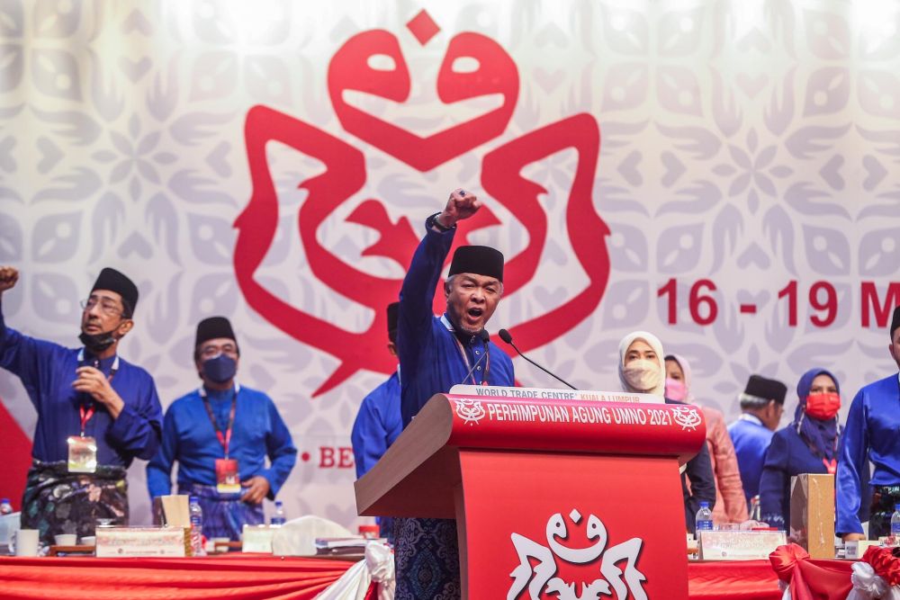Umno president Datuk Seri Ahmad Zahid Hamidi delivers a speech at the 2021 Umno General Assembly at the World Trade Centre Kuala Lumpur March 19, 2022. u00e2u20acu201d Picture by Hari Anggara