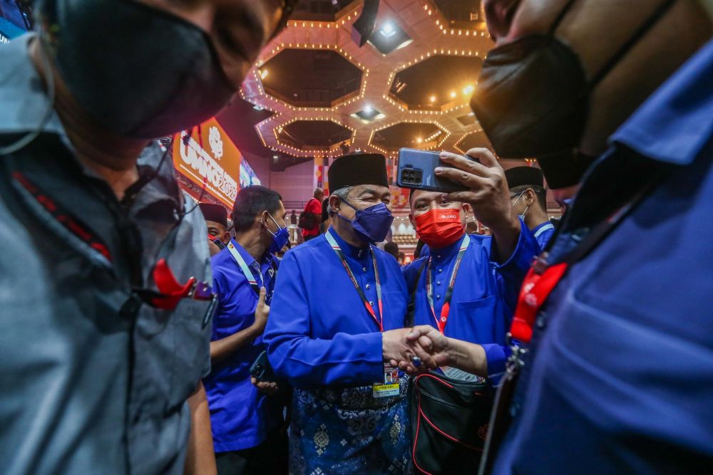 Umno president Datuk Seri Ahmad Zahid Hamidi is pictured at the 2021 Umno General Assembly at the World Trade Centre Kuala Lumpur March 19, 2022. u00e2u20acu201d Picture by Hari Anggara