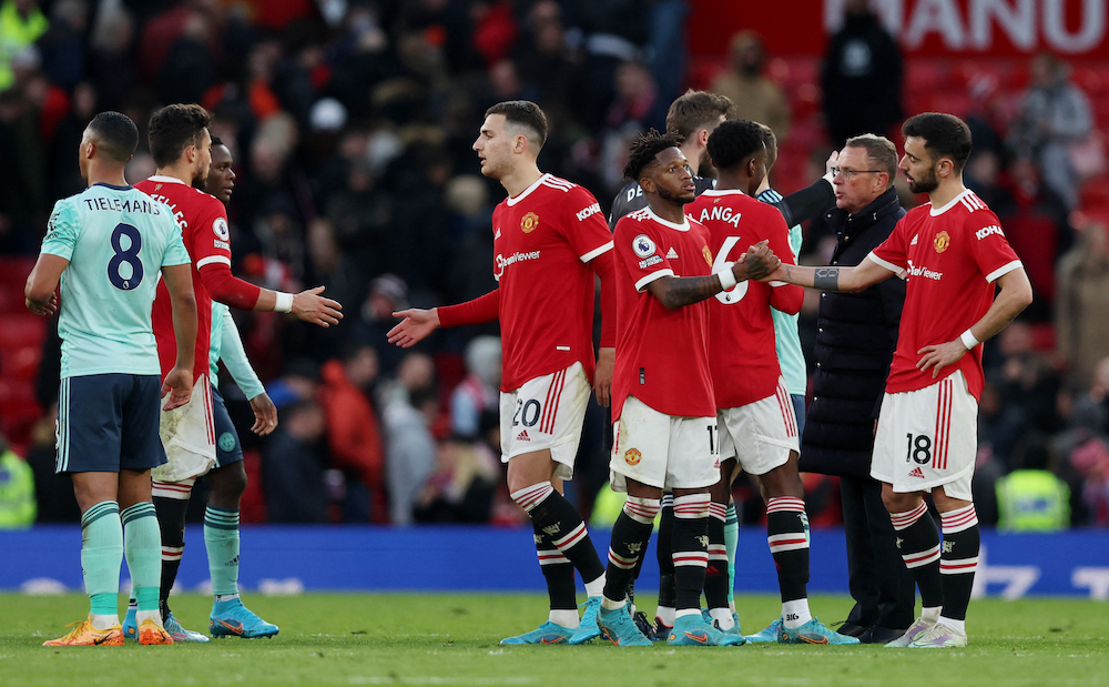 Manchester United interim manager Ralf Rangnick, Fred and Bruno Fernandes after the match against Leicester City in Manchester April 3, 2022. u00e2u20acu201d Reuters/Russell Cheyne pic