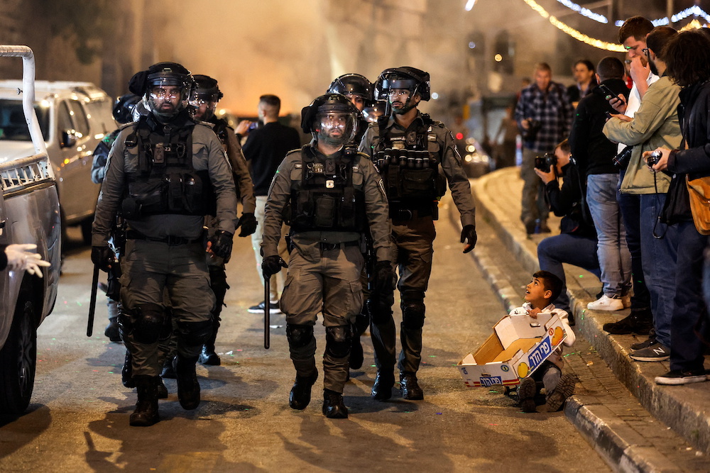 Israeli Border Police forces patrol the road during clashes between Israeli security forces and Palestinians near Damascus Gate by the entrance to Jerusalem's Old City April 3, 2022. u00e2u20acu201d Reuters pic