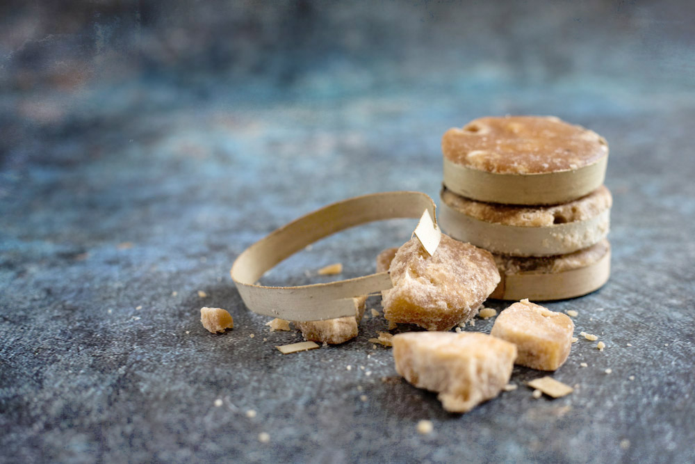 Palm sugar (such as 'gula Melaka') will add a lovely fragrance to the salad dressing.