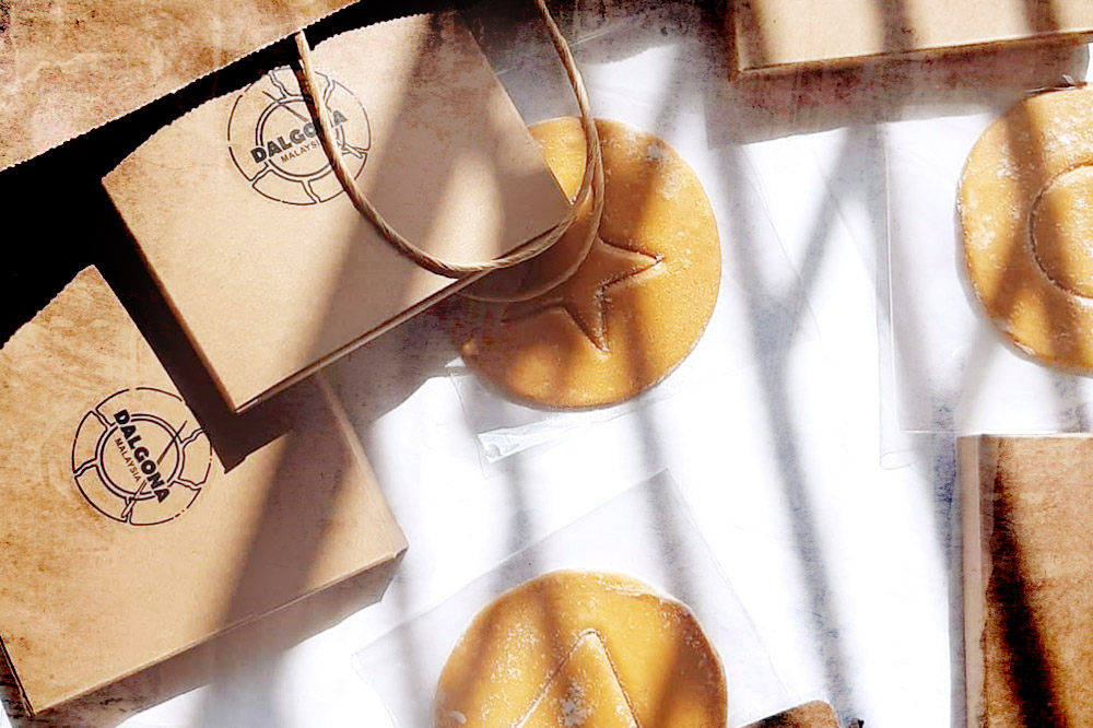 Packs of dalgona candy ready for pick-up and delivery, with Dalgona Malaysia’s branding.