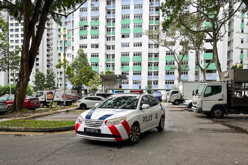 A police car seen patrolling the site of a Boon Lay Drive attack at about 4.30pm on April 7, 2022. u00e2u20acu201d TODAY pic