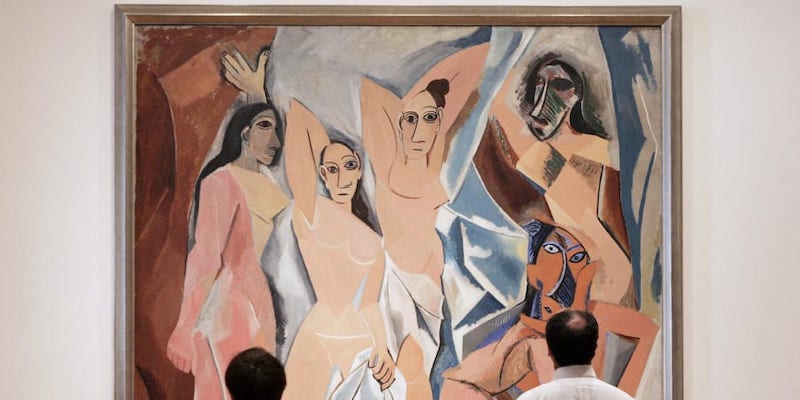 Two people view Pablo Picasso's u00e2u20acu02dcLes Demoiselles d'Avignonu00e2u20acu2122 (1907) on display, 9 May 2007. u00e2u20acu201d AFP pic