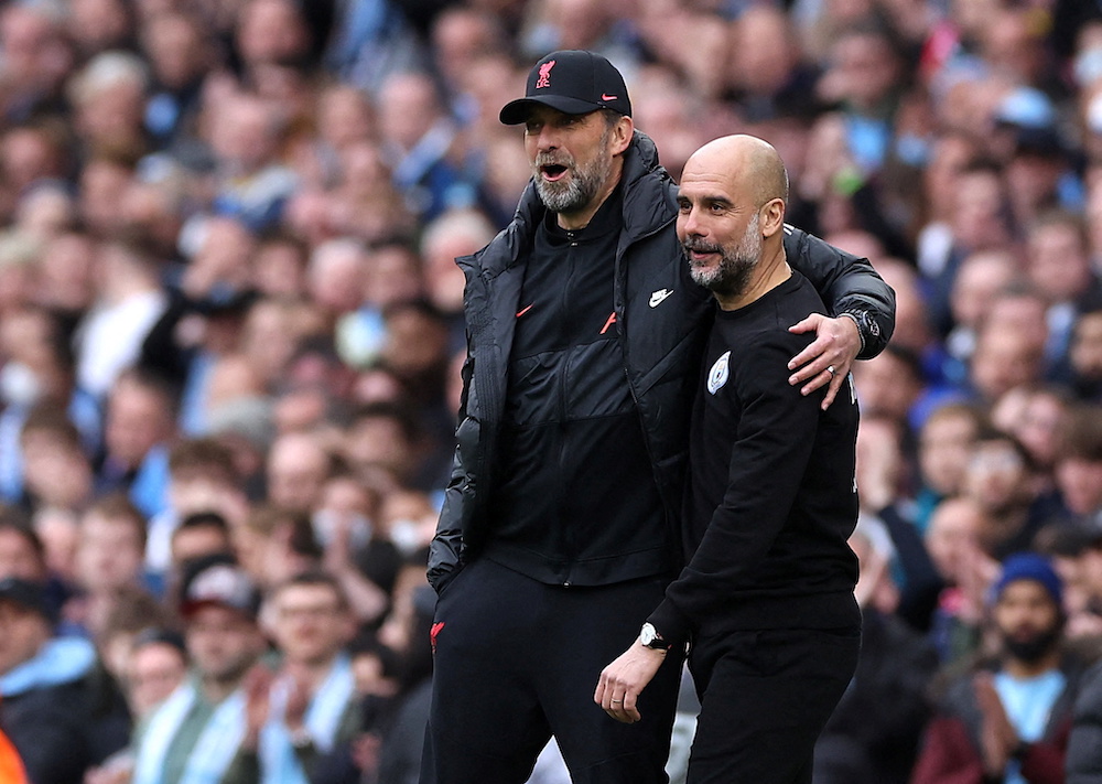 Liverpool manager Juergen Klopp and Manchester City manager Pep Guardiola at the Etihad Stadium, Manchester April 10, 2022. u00e2u20acu201d Reuters pic