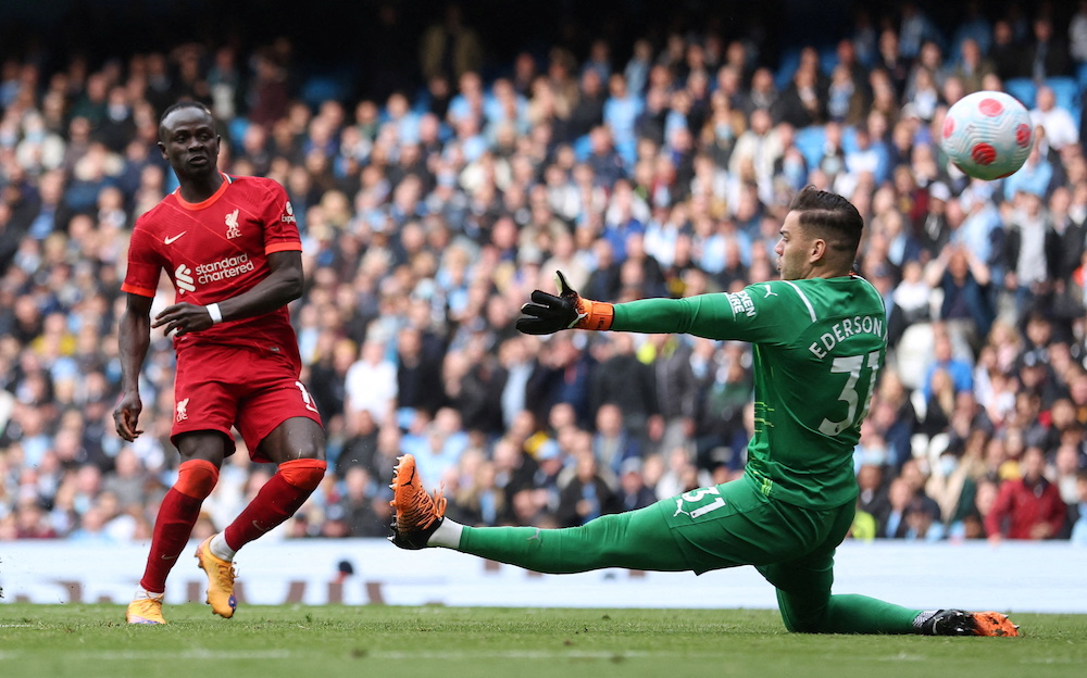 Liverpool's Sadio Mane scores their second goal against Manchester City at Etihad Stadium, Manchester April 10, 2022. u00e2u20acu201d Action Images via Reuters/Carl Recine 