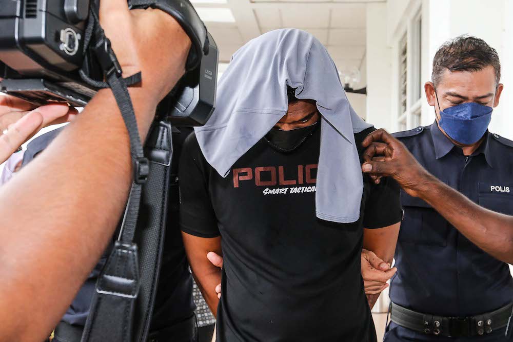 Abdul Jamal Ahmad is seen at the Balik Pulau Magistrate Court after being charged under Section 302 Penal Code for murder, April 15, 2022. u00e2u20acu201d Picture by Sayuti Zainudin