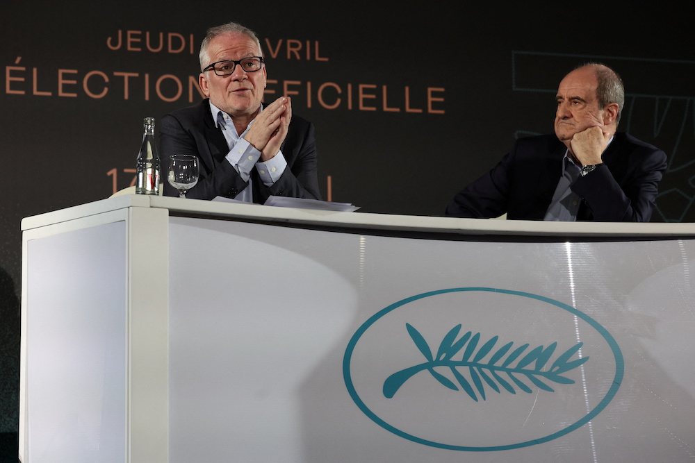 Cannes Film festival General Delegate Thierry Fremaux and Cannes Film festival President Pierre Lescure talk during the presentation of the official selection of the 75th Cannes International Film Festival in Paris, France, April 14, 2022. u00e2u20acu201d Reuters pic