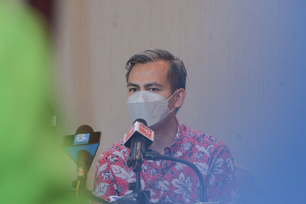 Representative of Datuk Seri Anwar Ibrahim, Fahmi Fadzil speaks during a press conference on the Najib vs Anwar debate, Kuala Lumpur April 17, 2022. — Picture by Miera Zulyana