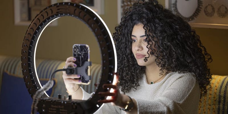 Mariam Ashraf, a teacher and u00e2u20acu02dcnatural hair influenceru00e2u20acu2122, during a live-stream at her home in Egypt's capital Cairo. u00e2u20acu201d AFP pic