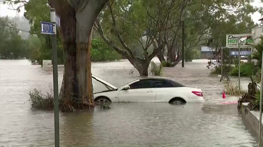 A car is seen submerged in floodwater following heavy rains in the northern town of Lismore, New South Wales, Australia March 30, 2022 in this still image taken from a video. u00e2u20acu201d Picture by Seven Network/Handout via Reuters
