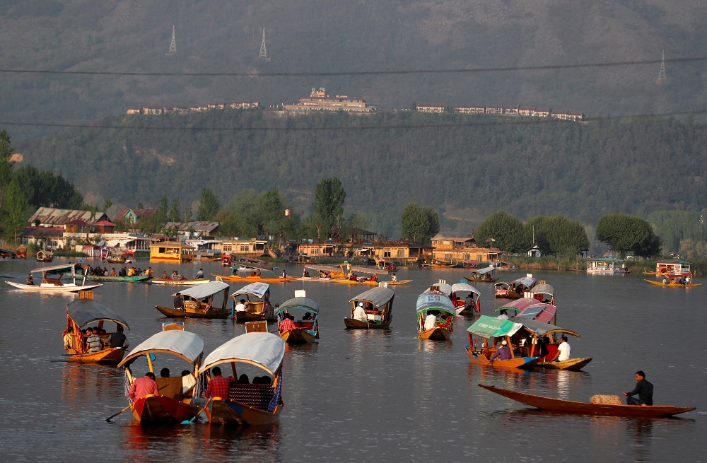 Tourists ride u00e2u20acu02dcShikarasu00e2u20acu2122 or boats in the waters of Dal Lake in Srinagar, April 5, 2022. u00e2u20acu201d Reuters pic