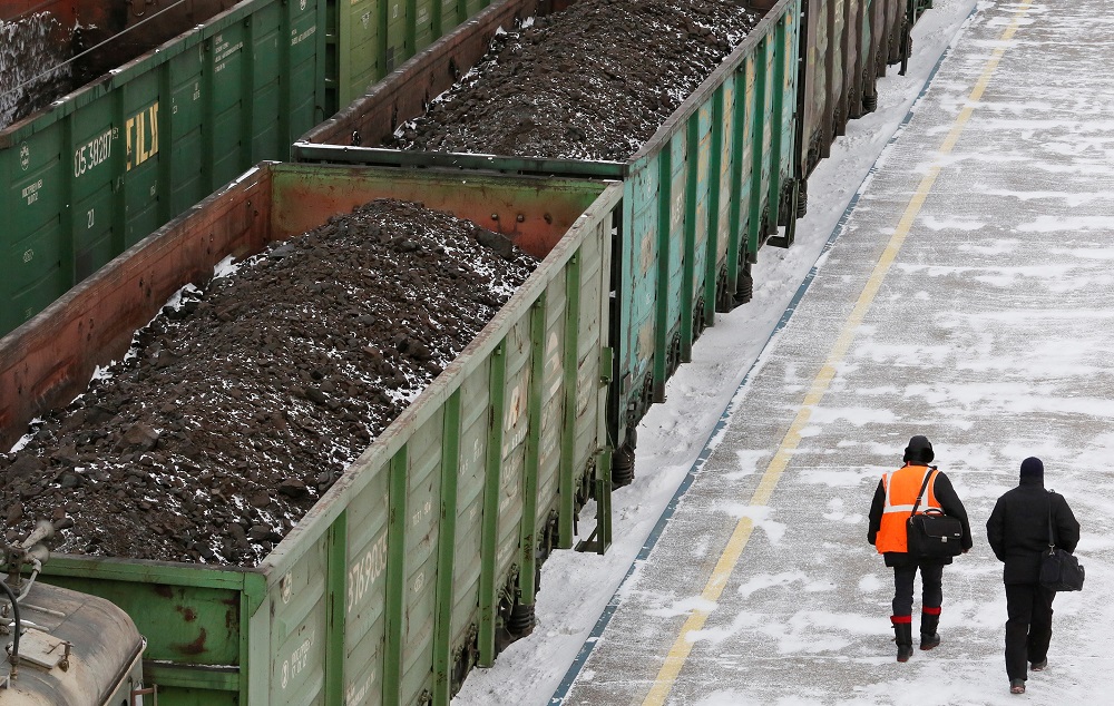 A machine loads a BelAZ dump-body truck with coal at the Chernigovsky opencast colliery, outside the town of Beryozovsky, Kemerovo region, Siberia, Russia April 4, 2016. u00e2u20acu201d Reuters pic