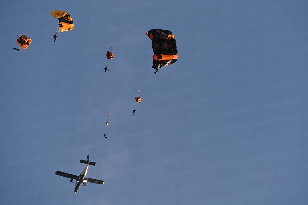 Members of the US Army demonstration parachute team the Golden Knights descend into Nationals Park before the game between the Washington Nationals and the Arizona Diamondbacks April 20, 2022. u00e2u20acu201d Picture by Tommy Gilligan-USA TODAY Sports via Reuters 