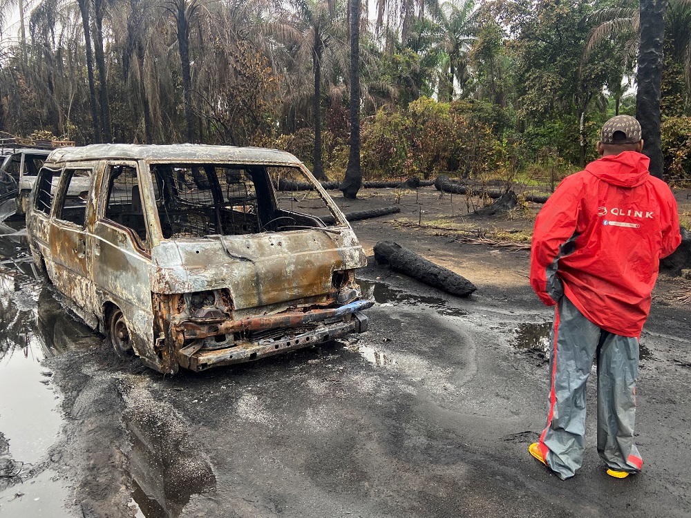A man stands at the scene of explosion in which over 100 people lost their lives, at an illegal crude oil bunkering site at Abaezi forest, in Ohaji-Egbema Local Government Area of Imo state, Nigeria April 24, 2022.  u00e2u20acu201d  Reuters pic