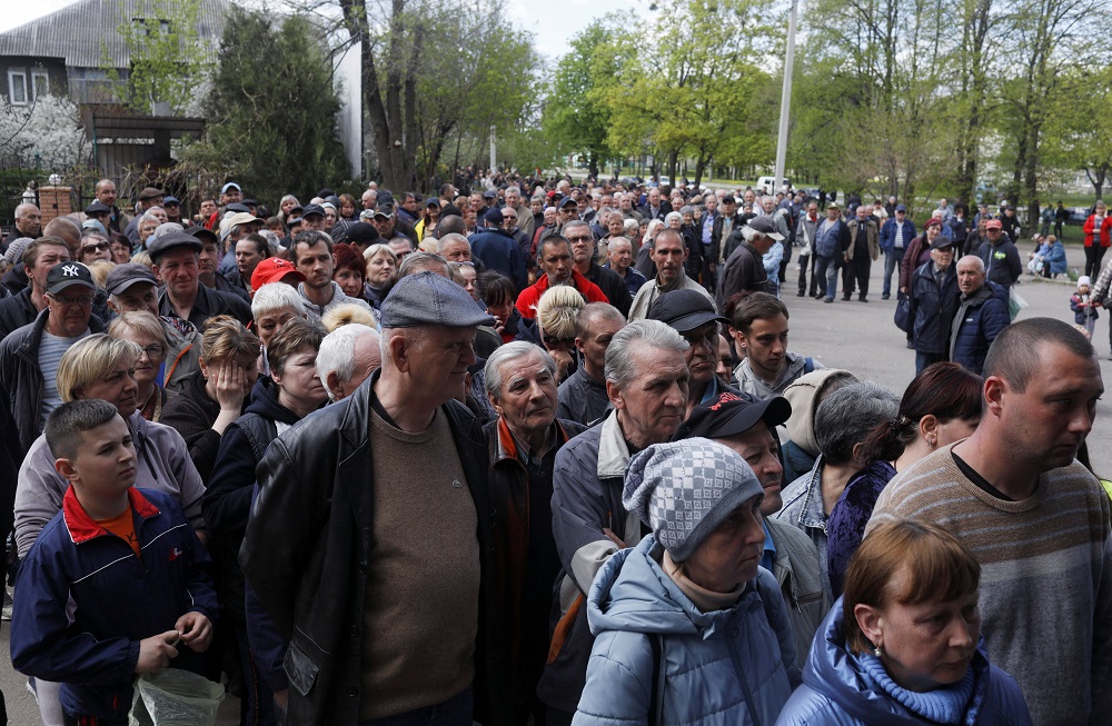 Residents gather to receive aid donations amid Russiau00e2u20acu2122s attack on Ukraine, in Kharkiv, Ukraine April 28, 2022. u00e2u20acu201d Reuters pic