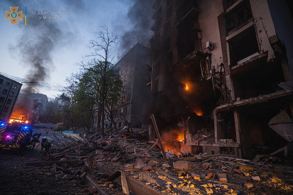 Rescuers work at a site of a residential building damaged by a missile strike in Kyiv in this handout picture released April 29, 2022. u00e2u20acu201d Picture by press service of the State Emergency Service of Ukraine/Handout via Reuters