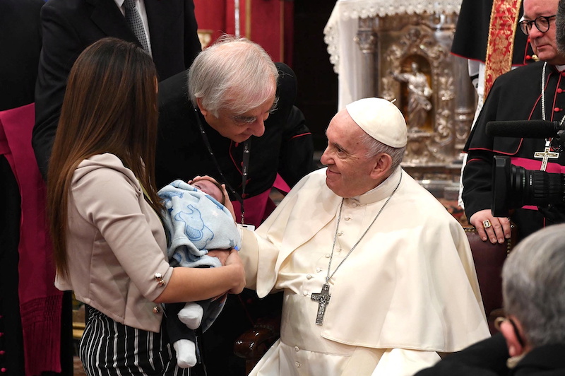 Pope Francis blesses a child while visiting the Basilica of St. Paul in Rabat, Malta April 3, 2022. u00e2u20acu201d Pierre Department of Information-Malta handout via Reuters pic 