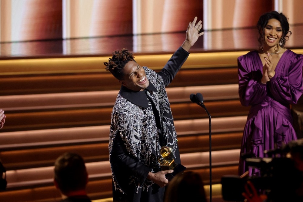 Jon Batiste accepts the Album of the Year award for u00e2u20acu02dcWe Areu00e2u20acu2122 onstage during the 64th Annual Grammy Awards at MGM Grand Garden Arena in Las Vegas April 3, 2022. u00e2u20acu201d Getty Images via AFP