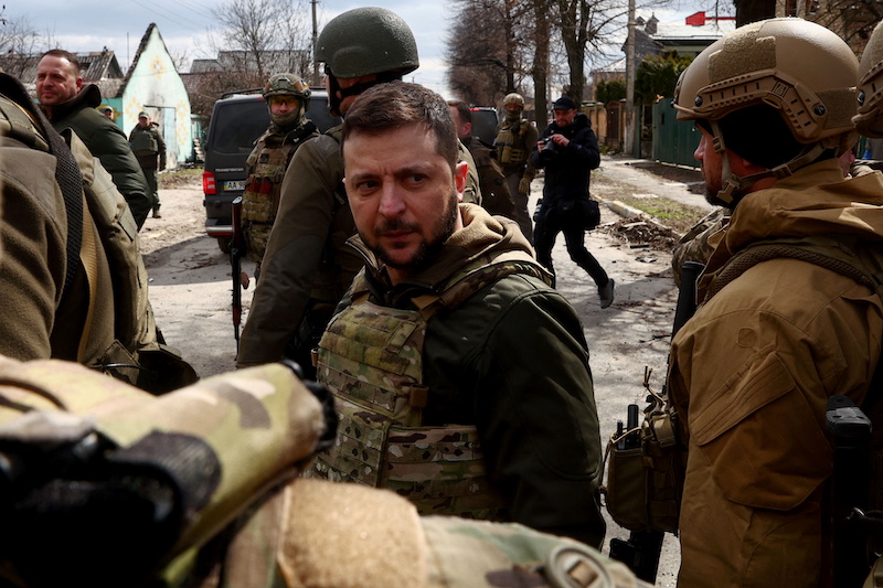 Ukraine's President Volodymyr Zelenskiy looks on as he is surrounded by Ukrainian servicemen as Russia's invasion of Ukraine continues, in Bucha, Ukraine, April 4, 2022. u00e2u20acu201d Reuters pic