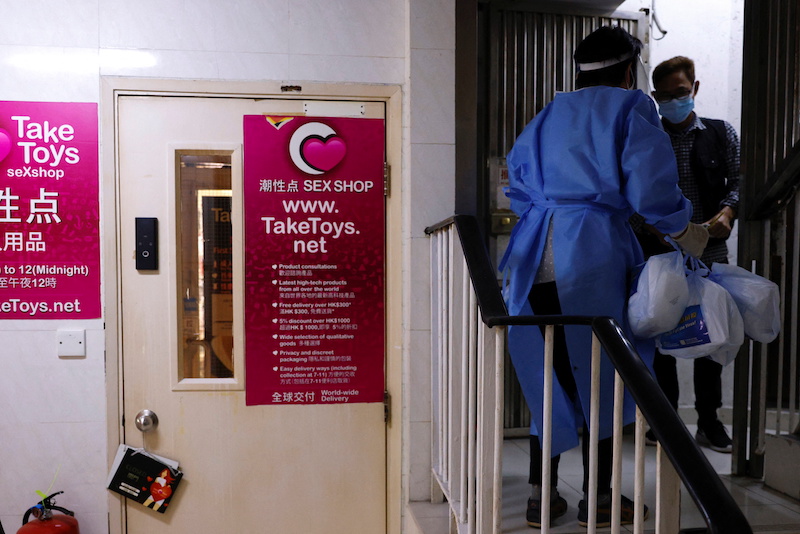 A volunteer holds anti-epidemic bags as she delivers them to residents during the coronavirus disease (Covid-19) pandemic, in Hong Kong, China, April 3, 2022. u00e2u20acu201d Reuters picnn