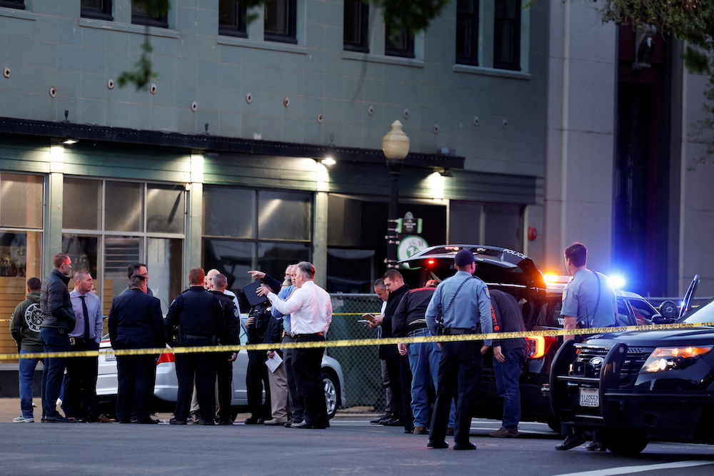 Police are seen after an early-morning shooting in a stretch of the downtown near the Golden 1 Centre arena in Sacramento, California, April 3, 2022. u00e2u20acu201d Reuters picnn