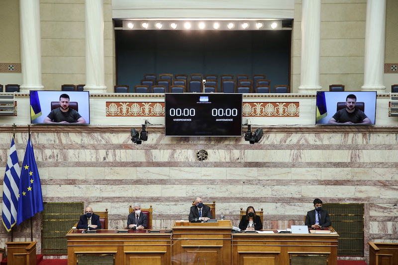 Ukrainian President Volodymyr Zelenskiy appears on screens as he addresses the Greek parliament via teleconference in Athens, Greece, April 7, 2022. u00e2u20acu201d Reuters pic