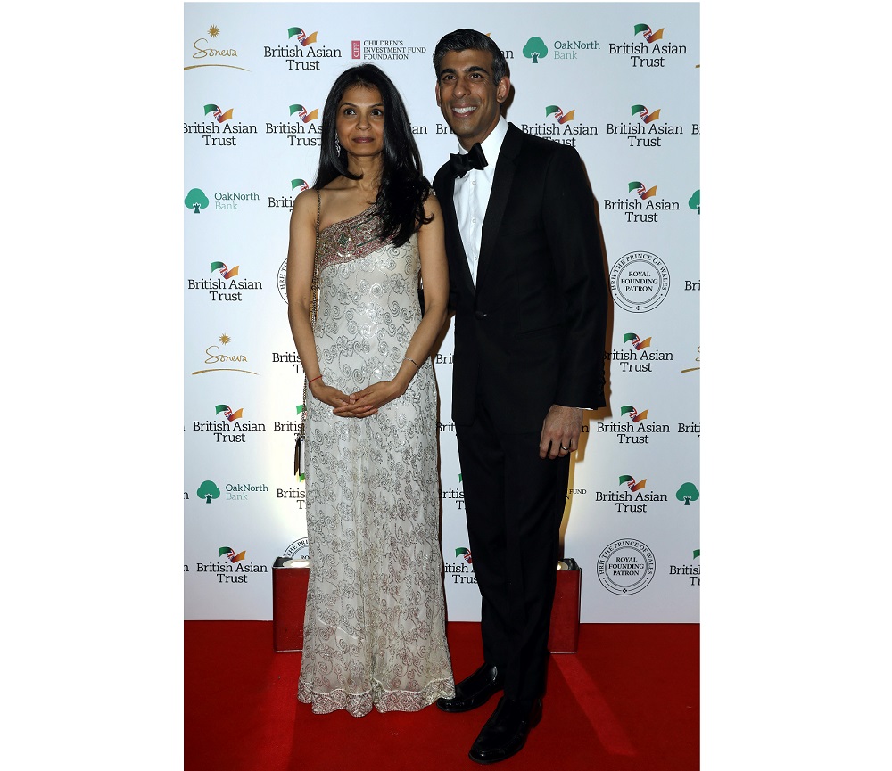 Britain's Chancellor of the Exchequer Rishi Sunak (right) poses with his wife Akshata Murty during a reception to celebrate the British Asian Trust at The British Museum in London February 9, 2022. u00e2u20acu201d AFP pic