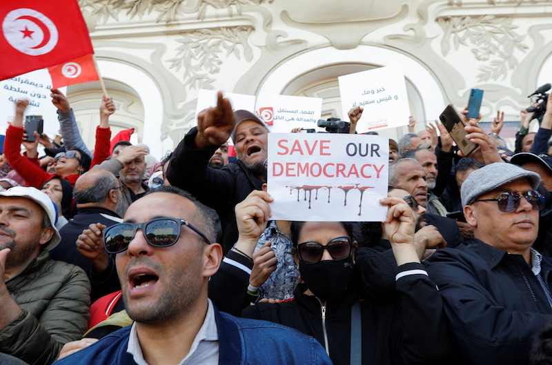 Demonstrators shout slogans and carry banners during a protest against Tunisian President Kais Saied after he dissolved the parliament last month, in Tunis, Tunisia April 10, 2022. u00e2u20acu201d Reuters picnn
