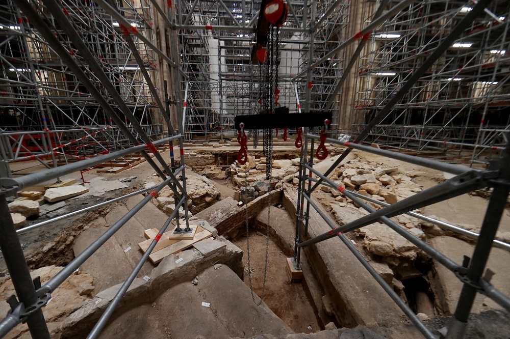 A picture shows scaffolding surrounding the damaged vaults at the reconstruction site, where the discovery of a 14th century sarcophagus was made, in the Notre-Dame cathedral in Paris April 15, 2022. u00e2u20acu201d AFP pic