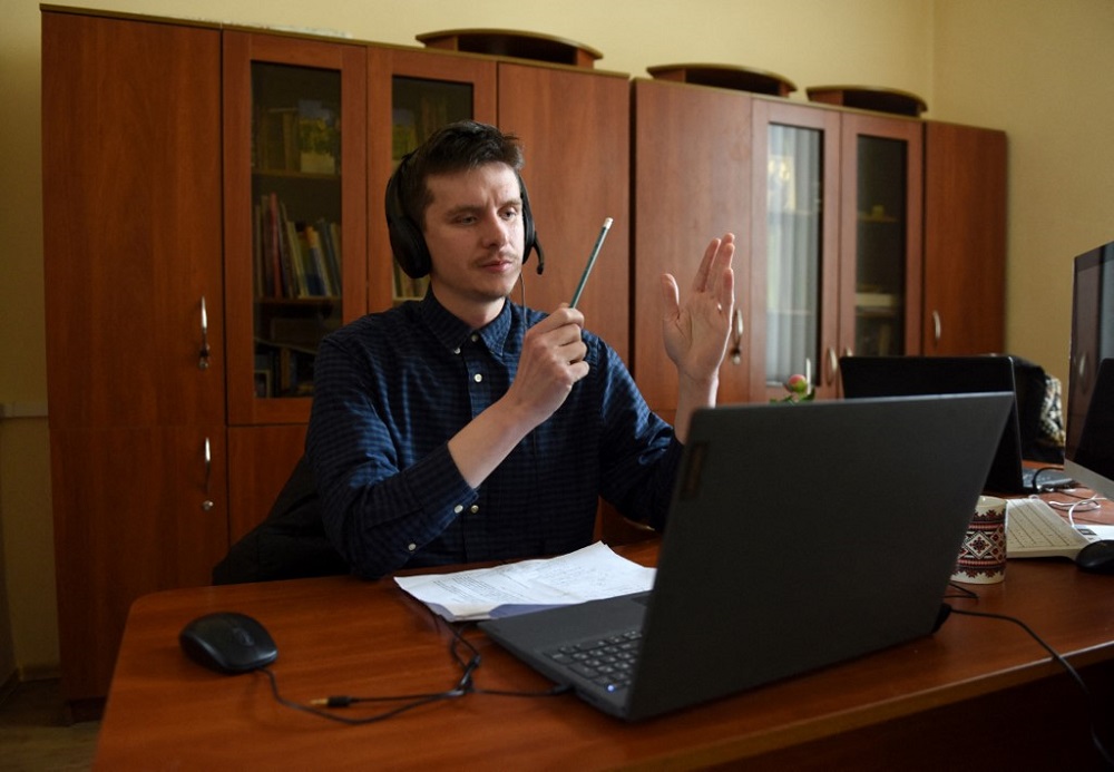 Ukrainian academic Nazar Danchyshyn, 30, leads an online Ukrainian language conversation class in the western Ukrainian city of Lviv April 5, 2022. u00e2u20acu201d AFP pic