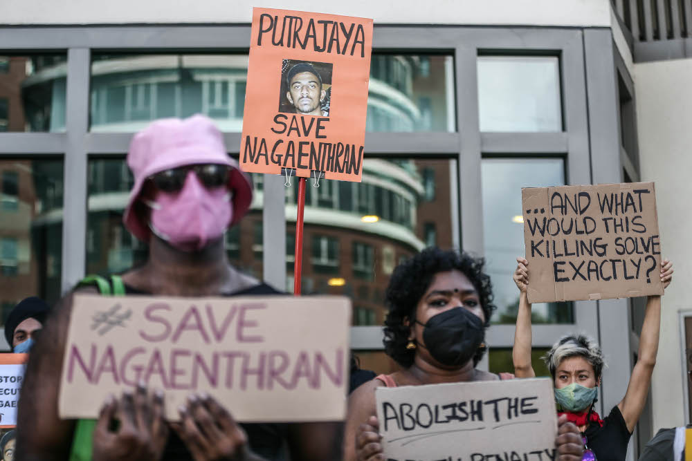 MIC activists hold poster and banners of Nagaenthran K. Dharmalingam to protest against his impending execution outside the Singapore embassy in Kuala Lumpur April 23, 2022. u00e2u20acu201d Picture by Hari Anggara