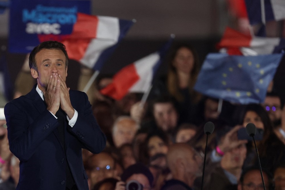 French President and La Republique en Marche party candidate for re-election Emmanuel Macron celebrates after his victory in Franceu00e2u20acu2122s presidential election, at the Champ de Mars in Paris April 24, 2022. u00e2u20acu201d AFP pic