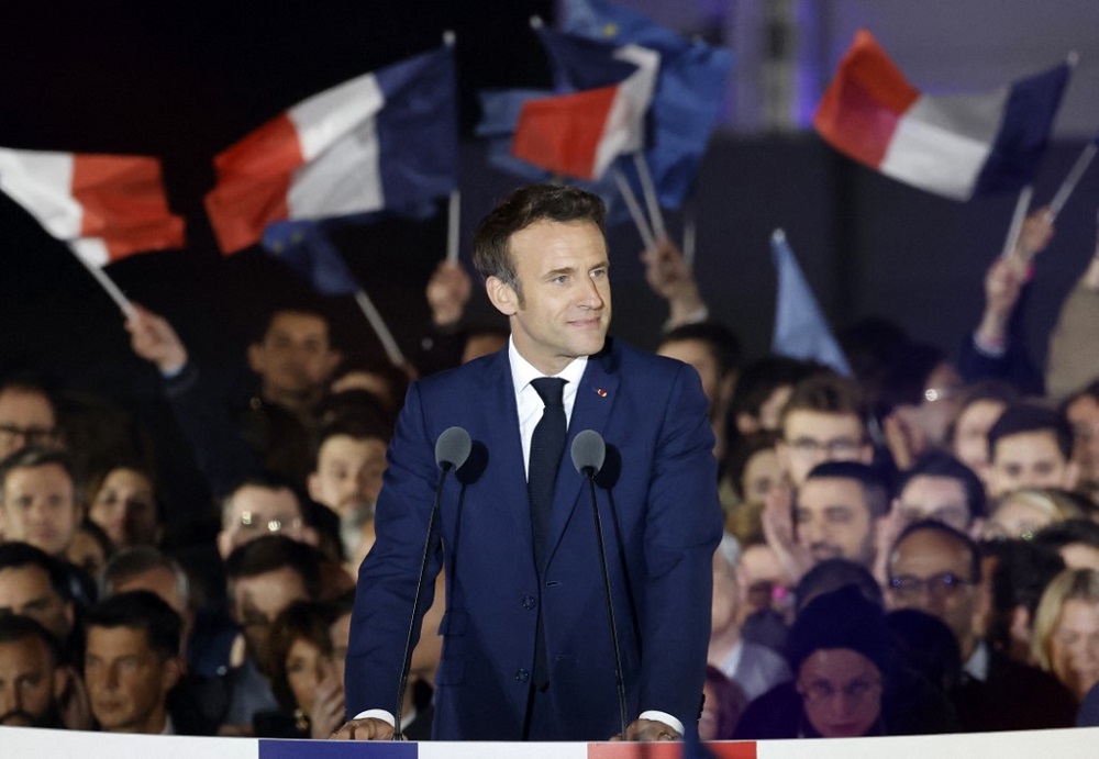 French President and La Republique en Marche party candidate for re-election Emmanuel Macron reacts as he delivers a speech after his victory in Franceu00e2u20acu2122s presidential election, at the Champ de Mars in Paris April 24, 2022. u00e2u20acu201d AFP pic
