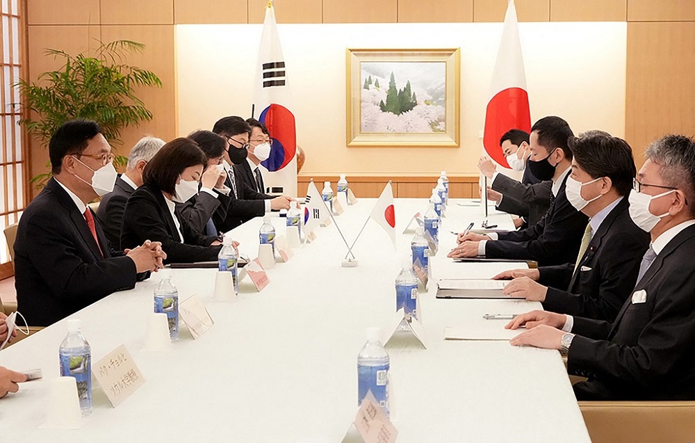 Deputy speaker of South Koreau00e2u20acu2122s National Assembly Chung Jin-suk (left) speaks with Japanu00e2u20acu2122s Foreign Minister Yoshimasa Hayashi (second right) during their meeting in Tokyo April 25, 2022. u00e2u20acu201d Picture courtesy of Ministry of Foreign Affairs Japan via AF